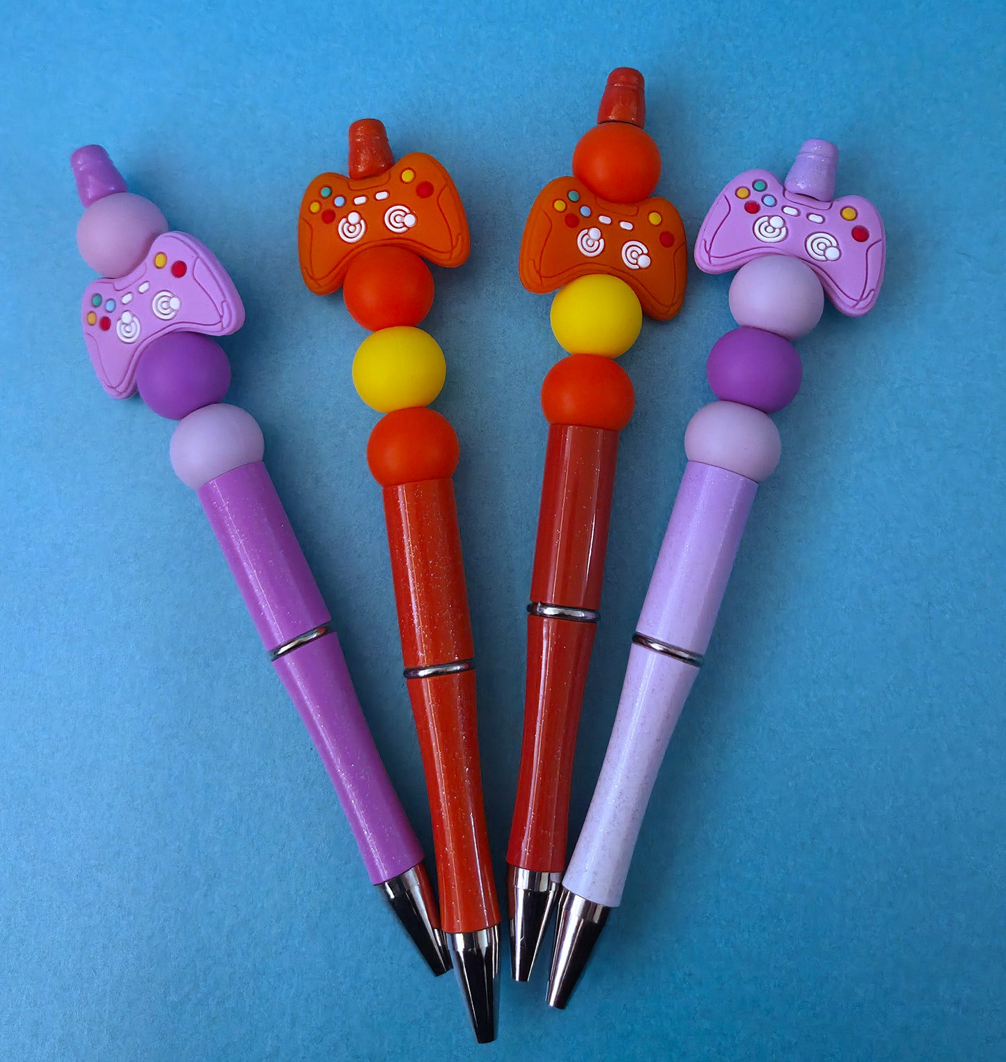 Game controller beaded pens