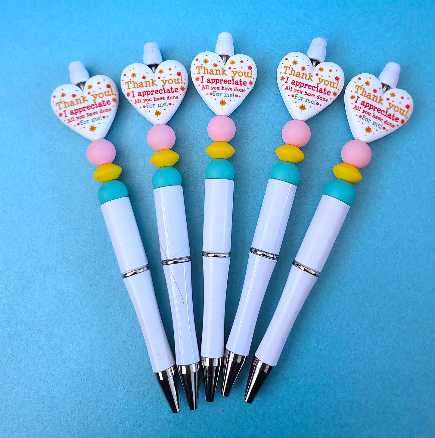 Beaded pens with quotes